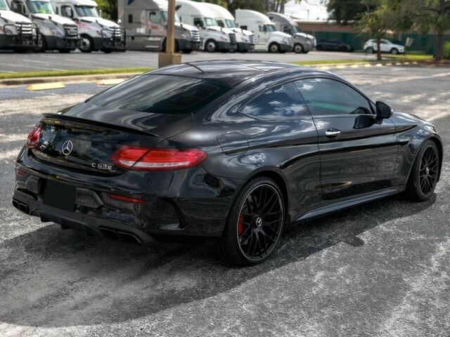 Черный Мерседес Ц-Класс, объемом двигателя 4 л и пробегом 36 тыс. км за 30000 $, фото 6 на Automoto.ua