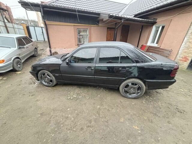 Чорний Мерседес Ц-Клас, об'ємом двигуна 1.8 л та пробігом 240 тис. км за 3600 $, фото 19 на Automoto.ua
