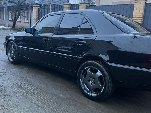 Чорний Мерседес Ц-Клас, об'ємом двигуна 1.8 л та пробігом 240 тис. км за 3600 $, фото 9 на Automoto.ua