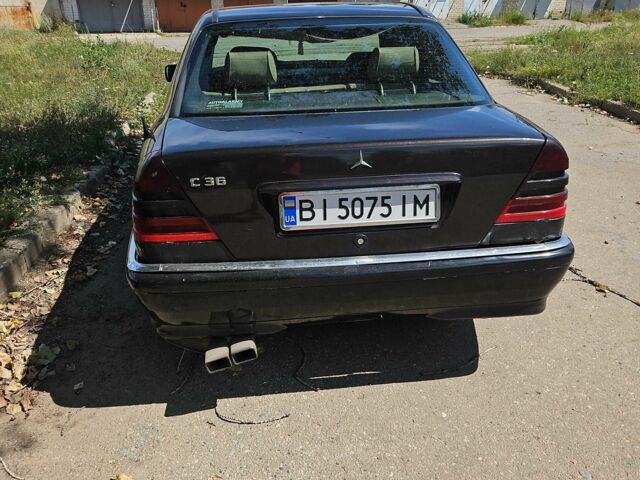 Мерседес Ц-Клас 1996 у Харкові на Automoto.ua Чорний Мерседес Ц-Клас, об'ємом двигуна 2.3 л та пробігом 427 тис. км за 3200 $, фото 2 на Automoto.ua