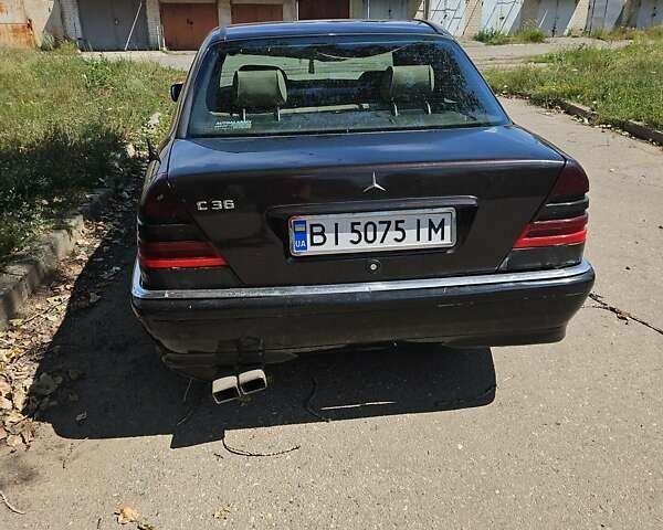 Чорний Мерседес Ц-Клас, об'ємом двигуна 2.3 л та пробігом 400 тис. км за 3200 $, фото 2 на Automoto.ua