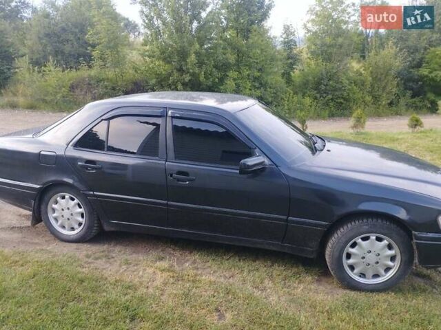 Чорний Мерседес Ц-Клас, об'ємом двигуна 2 л та пробігом 380 тис. км за 2999 $, фото 1 на Automoto.ua