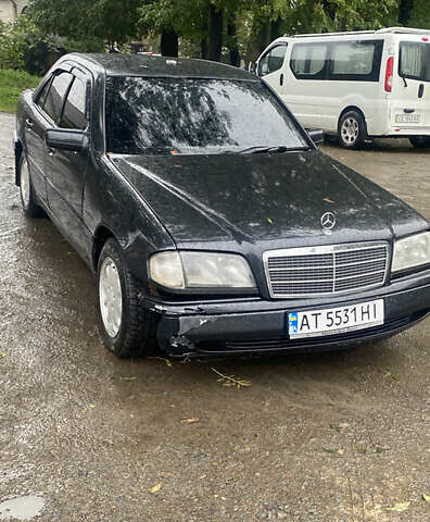 Чорний Мерседес Ц-Клас, об'ємом двигуна 2 л та пробігом 706 тис. км за 2800 $, фото 6 на Automoto.ua