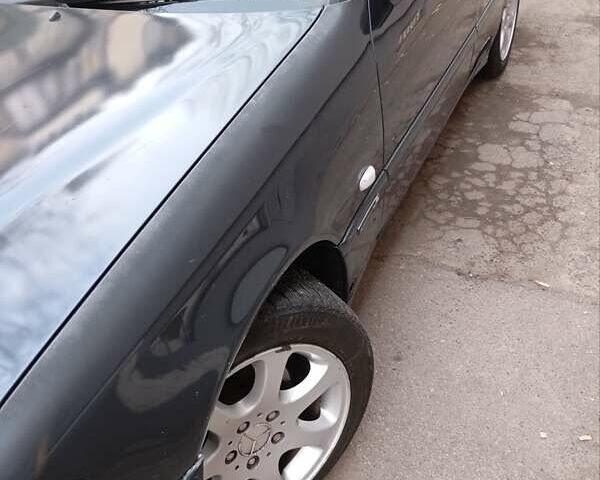 Черный Мерседес Ц-Класс, объемом двигателя 1.8 л и пробегом 321 тыс. км за 2750 $, фото 8 на Automoto.ua