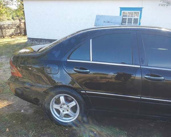 Чорний Мерседес Ц-Клас, об'ємом двигуна 2 л та пробігом 450 тис. км за 3400 $, фото 7 на Automoto.ua
