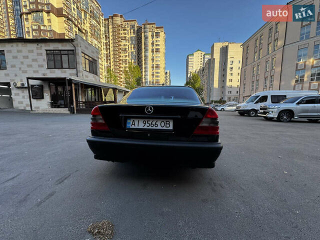 Черный Мерседес Ц-Класс, объемом двигателя 1.8 л и пробегом 258 тыс. км за 4300 $, фото 4 на Automoto.ua