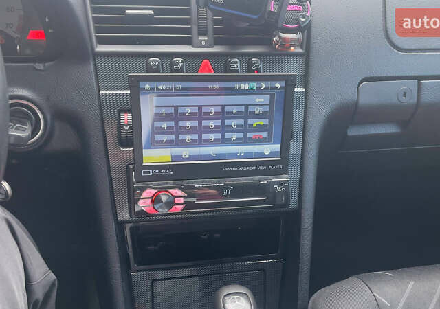 Чорний Мерседес Ц-Клас, об'ємом двигуна 2 л та пробігом 260 тис. км за 2598 $, фото 16 на Automoto.ua