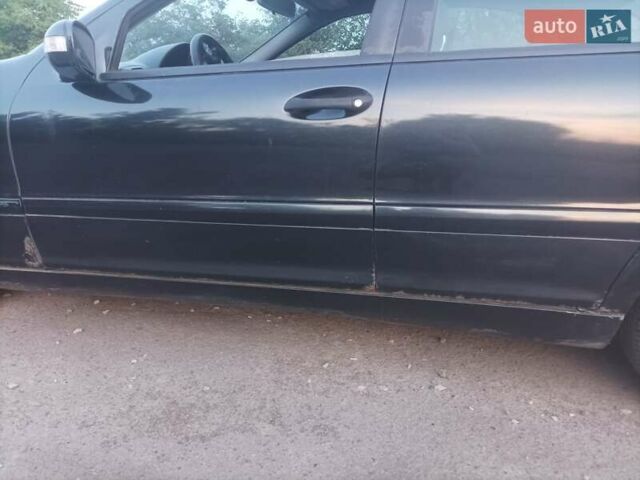 Чорний Мерседес Ц-Клас, об'ємом двигуна 2 л та пробігом 220 тис. км за 3700 $, фото 6 на Automoto.ua