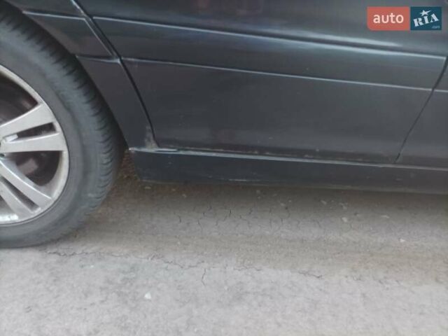 Чорний Мерседес Ц-Клас, об'ємом двигуна 2 л та пробігом 220 тис. км за 3700 $, фото 1 на Automoto.ua