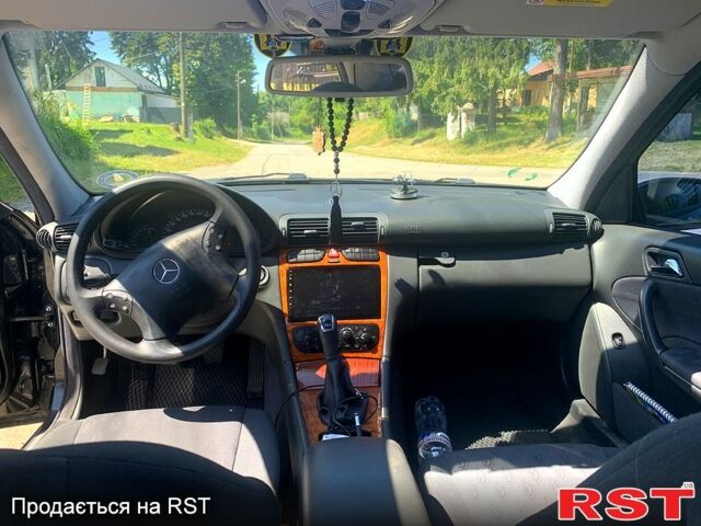 Чорний Мерседес Ц-Клас, об'ємом двигуна 1.8 л та пробігом 240 тис. км за 5500 $, фото 6 на Automoto.ua