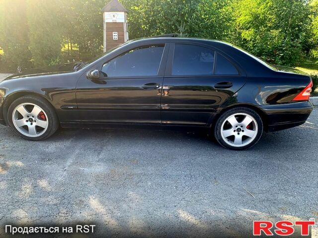 Черный Мерседес Ц-Класс, объемом двигателя 1.8 л и пробегом 240 тыс. км за 5500 $, фото 1 на Automoto.ua