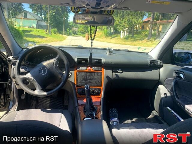 Черный Мерседес Ц-Класс, объемом двигателя 1.8 л и пробегом 240 тыс. км за 5500 $, фото 7 на Automoto.ua