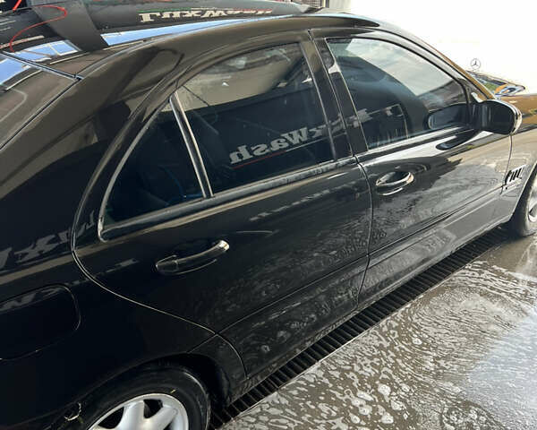 Чорний Мерседес Ц-Клас, об'ємом двигуна 2 л та пробігом 297 тис. км за 4500 $, фото 8 на Automoto.ua