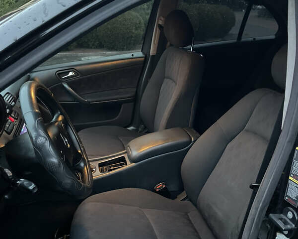 Черный Мерседес Ц-Класс, объемом двигателя 1.8 л и пробегом 251 тыс. км за 3900 $, фото 21 на Automoto.ua