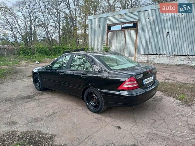 Черный Мерседес Ц-Класс, объемом двигателя 1.8 л и пробегом 288 тыс. км за 5000 $, фото 29 на Automoto.ua