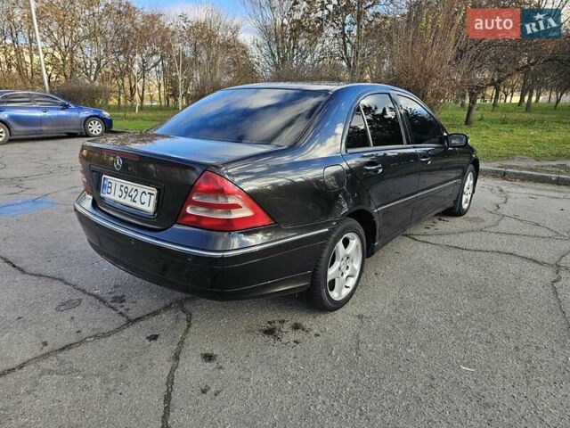 Черный Мерседес Ц-Класс, объемом двигателя 1.8 л и пробегом 338 тыс. км за 4500 $, фото 12 на Automoto.ua