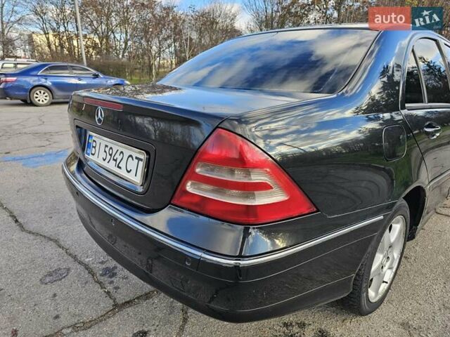 Черный Мерседес Ц-Класс, объемом двигателя 1.8 л и пробегом 338 тыс. км за 4500 $, фото 16 на Automoto.ua