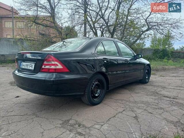 Черный Мерседес Ц-Класс, объемом двигателя 1.8 л и пробегом 288 тыс. км за 5000 $, фото 27 на Automoto.ua