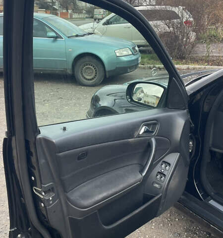 Чорний Мерседес Ц-Клас, об'ємом двигуна 1.8 л та пробігом 218 тис. км за 5500 $, фото 7 на Automoto.ua