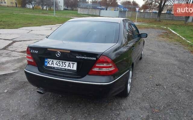 Черный Мерседес Ц-Класс, объемом двигателя 1.8 л и пробегом 390 тыс. км за 4700 $, фото 9 на Automoto.ua