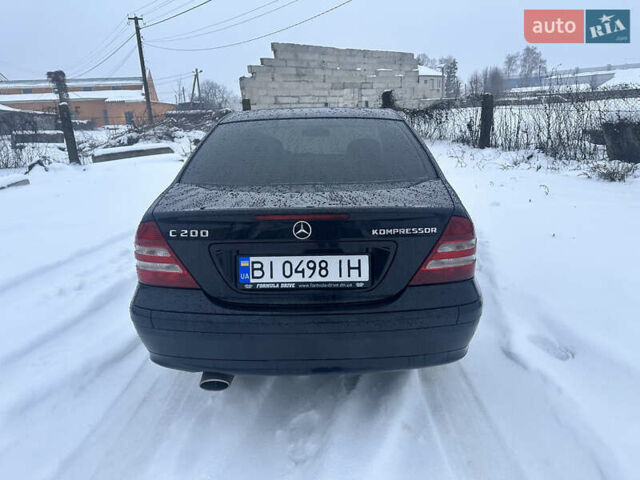 Черный Мерседес Ц-Класс, объемом двигателя 1.8 л и пробегом 284 тыс. км за 6500 $, фото 2 на Automoto.ua