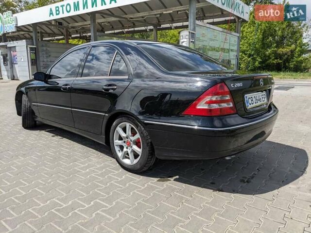 Чорний Мерседес Ц-Клас, об'ємом двигуна 3 л та пробігом 218 тис. км за 6600 $, фото 2 на Automoto.ua
