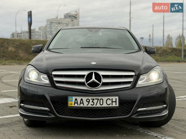Черный Мерседес Ц-Класс, объемом двигателя 1.8 л и пробегом 147 тыс. км за 11950 $, фото 1 на Automoto.ua