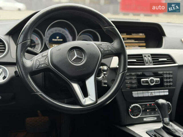 Черный Мерседес Ц-Класс, объемом двигателя 1.8 л и пробегом 147 тыс. км за 11950 $, фото 9 на Automoto.ua