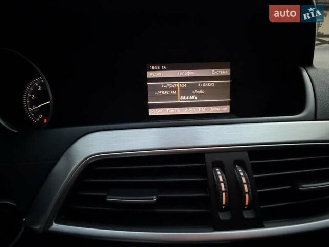 Черный Мерседес Ц-Класс, объемом двигателя 1.8 л и пробегом 147 тыс. км за 11950 $, фото 61 на Automoto.ua