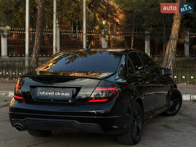 Чорний Мерседес Ц-Клас, об'ємом двигуна 1.8 л та пробігом 176 тис. км за 11999 $, фото 5 на Automoto.ua