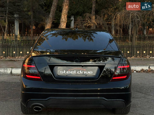 Чорний Мерседес Ц-Клас, об'ємом двигуна 1.8 л та пробігом 176 тис. км за 11999 $, фото 7 на Automoto.ua