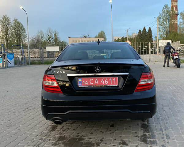 Чорний Мерседес Ц-Клас, об'ємом двигуна 1.8 л та пробігом 228 тис. км за 11200 $, фото 1 на Automoto.ua
