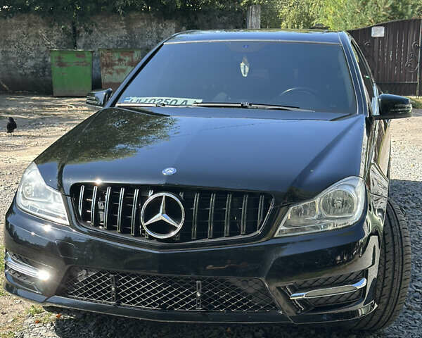 Черный Мерседес Ц-Класс, объемом двигателя 1.8 л и пробегом 223 тыс. км за 11950 $, фото 5 на Automoto.ua