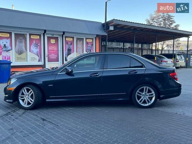 Черный Мерседес Ц-Класс, объемом двигателя 1.8 л и пробегом 243 тыс. км за 10900 $, фото 1 на Automoto.ua