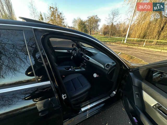 Черный Мерседес Ц-Класс, объемом двигателя 1.8 л и пробегом 229 тыс. км за 9800 $, фото 20 на Automoto.ua