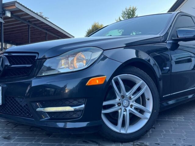 Чорний Мерседес Ц-Клас, об'ємом двигуна 1.8 л та пробігом 230 тис. км за 12600 $, фото 1 на Automoto.ua