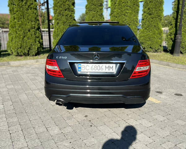 Чорний Мерседес Ц-Клас, об'ємом двигуна 1.8 л та пробігом 156 тис. км за 12800 $, фото 16 на Automoto.ua
