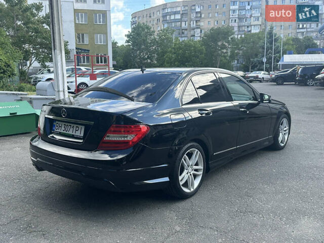 Черный Мерседес Ц-Класс, объемом двигателя 1.8 л и пробегом 165 тыс. км за 11500 $, фото 4 на Automoto.ua