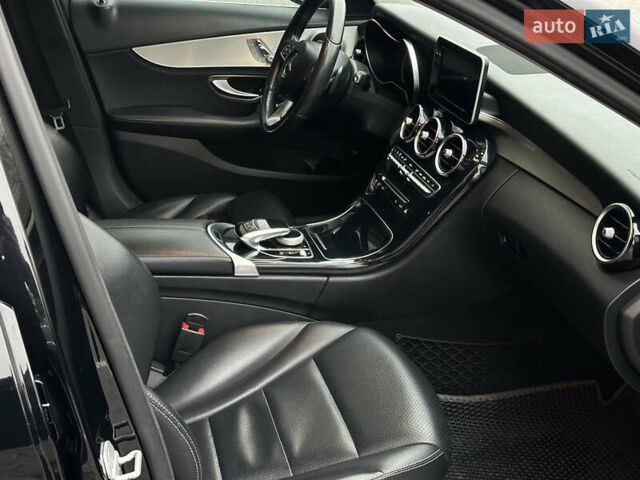 Чорний Мерседес Ц-Клас, об'ємом двигуна 2 л та пробігом 150 тис. км за 15950 $, фото 47 на Automoto.ua