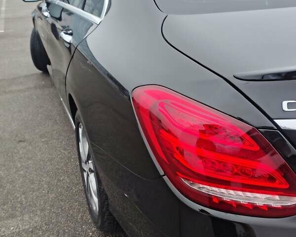 Черный Мерседес Ц-Класс, объемом двигателя 1.99 л и пробегом 105 тыс. км за 21500 $, фото 12 на Automoto.ua