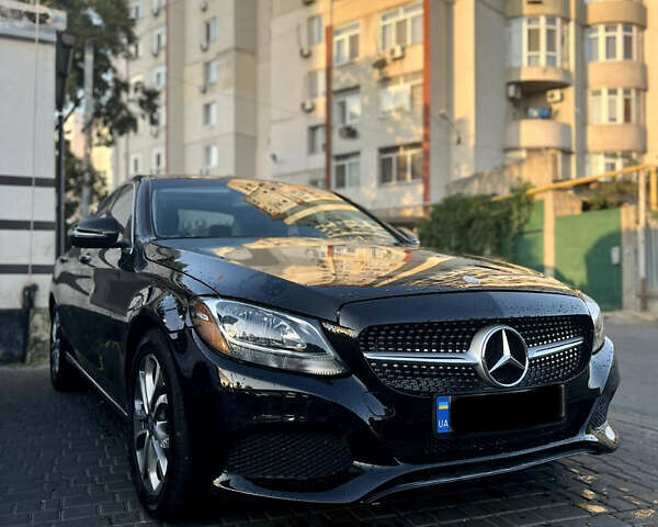 Чорний Мерседес Ц-Клас, об'ємом двигуна 2 л та пробігом 74 тис. км за 18600 $, фото 1 на Automoto.ua