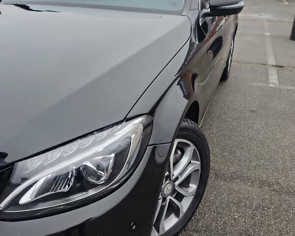 Черный Мерседес Ц-Класс, объемом двигателя 1.99 л и пробегом 105 тыс. км за 21500 $, фото 19 на Automoto.ua