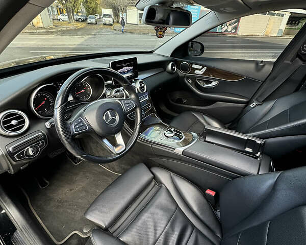 Чорний Мерседес Ц-Клас, об'ємом двигуна 2 л та пробігом 75 тис. км за 27500 $, фото 16 на Automoto.ua