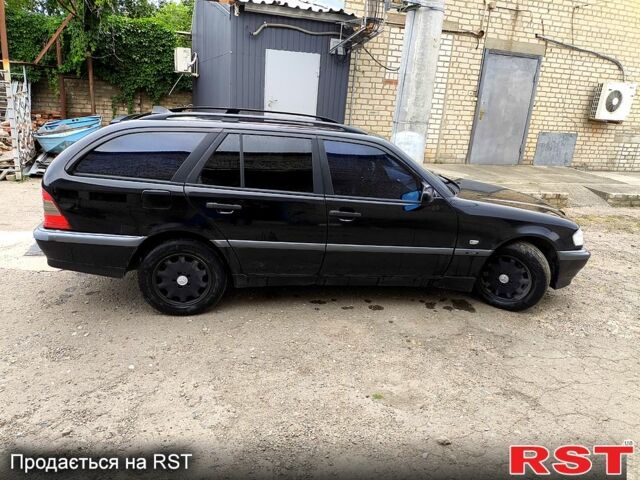 Чорний Мерседес Ц-Клас, об'ємом двигуна 2 л та пробігом 431 тис. км за 3000 $, фото 12 на Automoto.ua