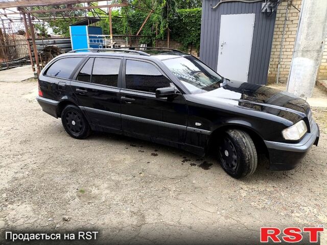 Чорний Мерседес Ц-Клас, об'ємом двигуна 2 л та пробігом 431 тис. км за 3000 $, фото 8 на Automoto.ua