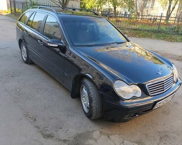 Черный Мерседес Ц-Класс, объемом двигателя 1.8 л и пробегом 348 тыс. км за 4300 $, фото 3 на Automoto.ua