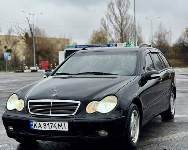 Черный Мерседес Ц-Класс, объемом двигателя 1.8 л и пробегом 165 тыс. км за 3999 $, фото 1 на Automoto.ua