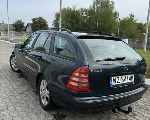 Чорний Мерседес Ц-Клас, об'ємом двигуна 2.2 л та пробігом 374 тис. км за 2299 $, фото 4 на Automoto.ua