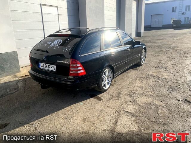 Черный Мерседес Ц-Класс, объемом двигателя 1.8 л и пробегом 350 тыс. км за 5000 $, фото 1 на Automoto.ua
