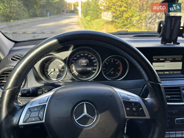 Чорний Мерседес Ц-Клас, об'ємом двигуна 2.2 л та пробігом 310 тис. км за 10999 $, фото 8 на Automoto.ua
